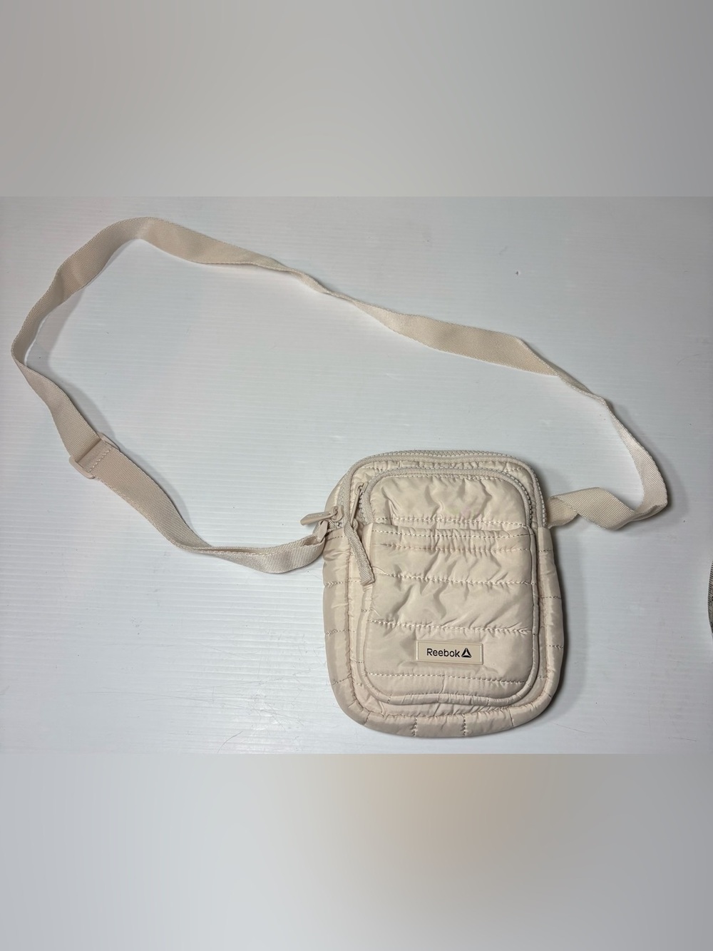 Reebok Quilted Crossbody Bag in Cream